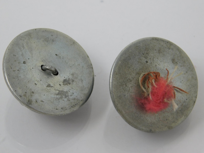pair of silver ball buttons