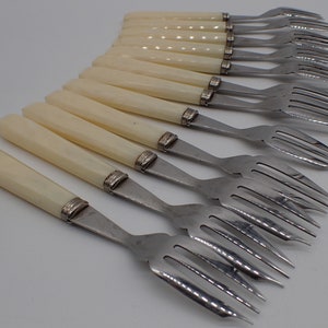 twelve place settings, vintage forks image 1