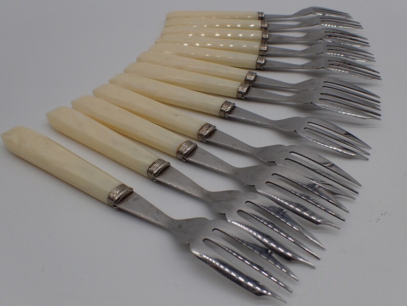 twelve place settings, vintage forks image 1