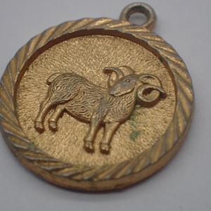 vintage astrological sign pendant