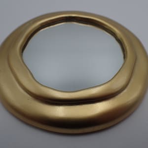 Vintage bronze pocket mirror