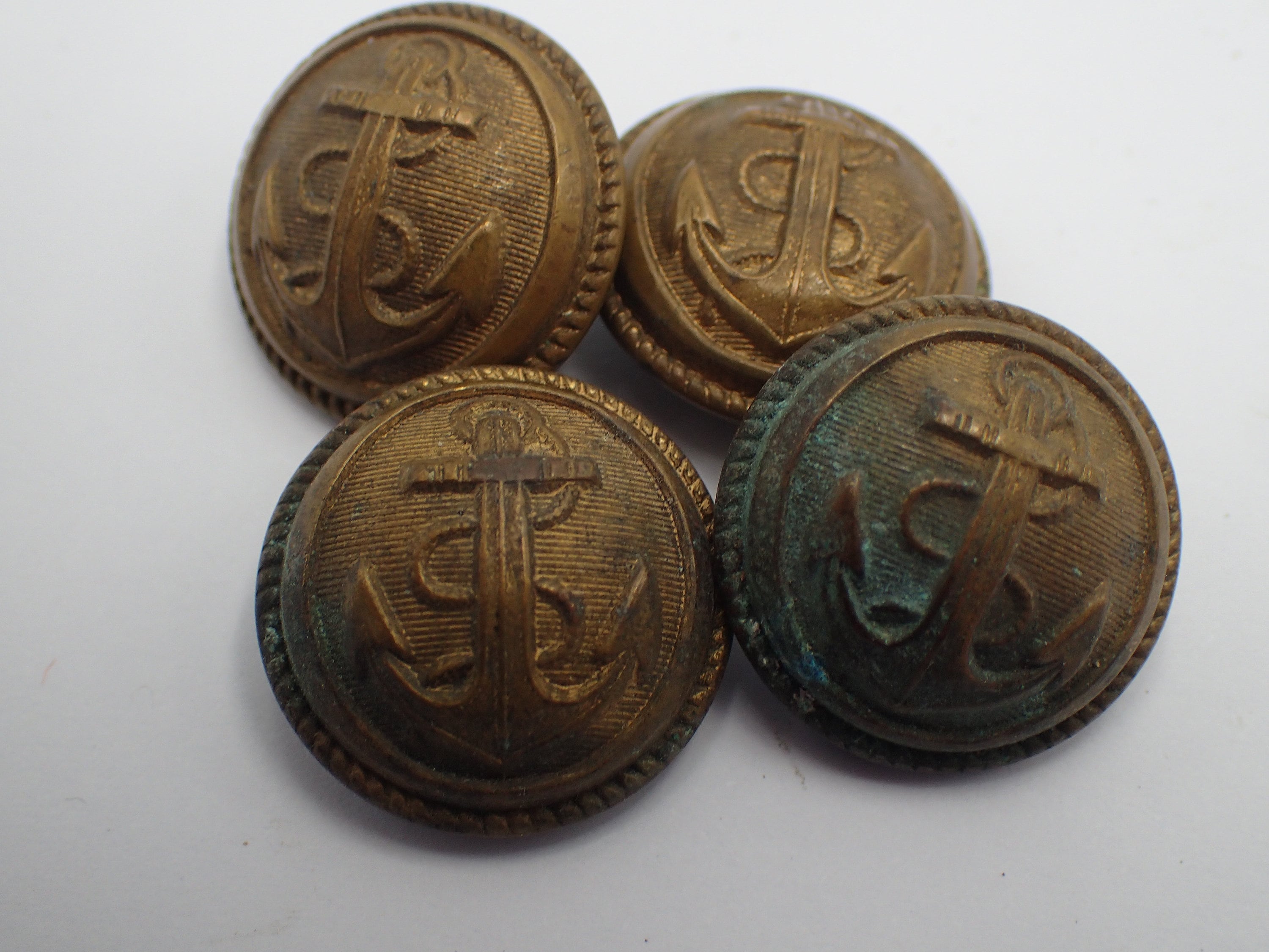 four vintage buttons, military navy
