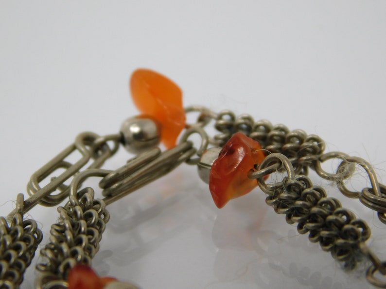 silver metal bracelet with agate sprig