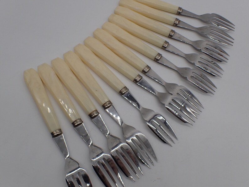 twelve place settings, vintage forks image 2