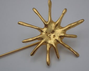épingle à cravate ,soleil en bronze par Sunsublin