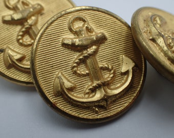 three vintage navy buttons