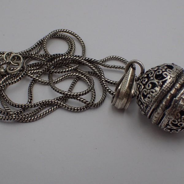 bola pendant from grose, bell on vintage chain