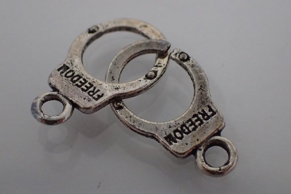 handcuffs pendant, freedom