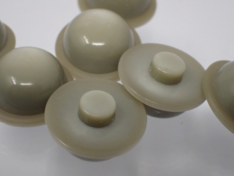 seven vintage hat buttons