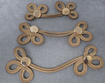 clothing decoration of strings and golden button