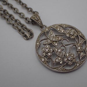 vintage silver necklace with rhinestone pendant