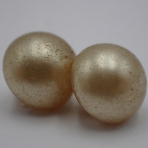 pair of pearl buttons