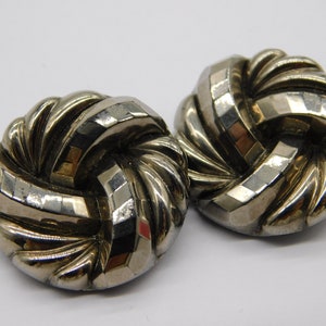 pair of art nouveau buttons in silver glass