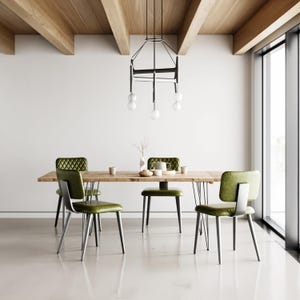 May include: A rectangular wooden dining table with four chairs featuring olive green quilted seats and dark metal legs. A black geometric pendant light with white spherical bulbs hangs above the table, which holds small ceramic bowls and a vase.