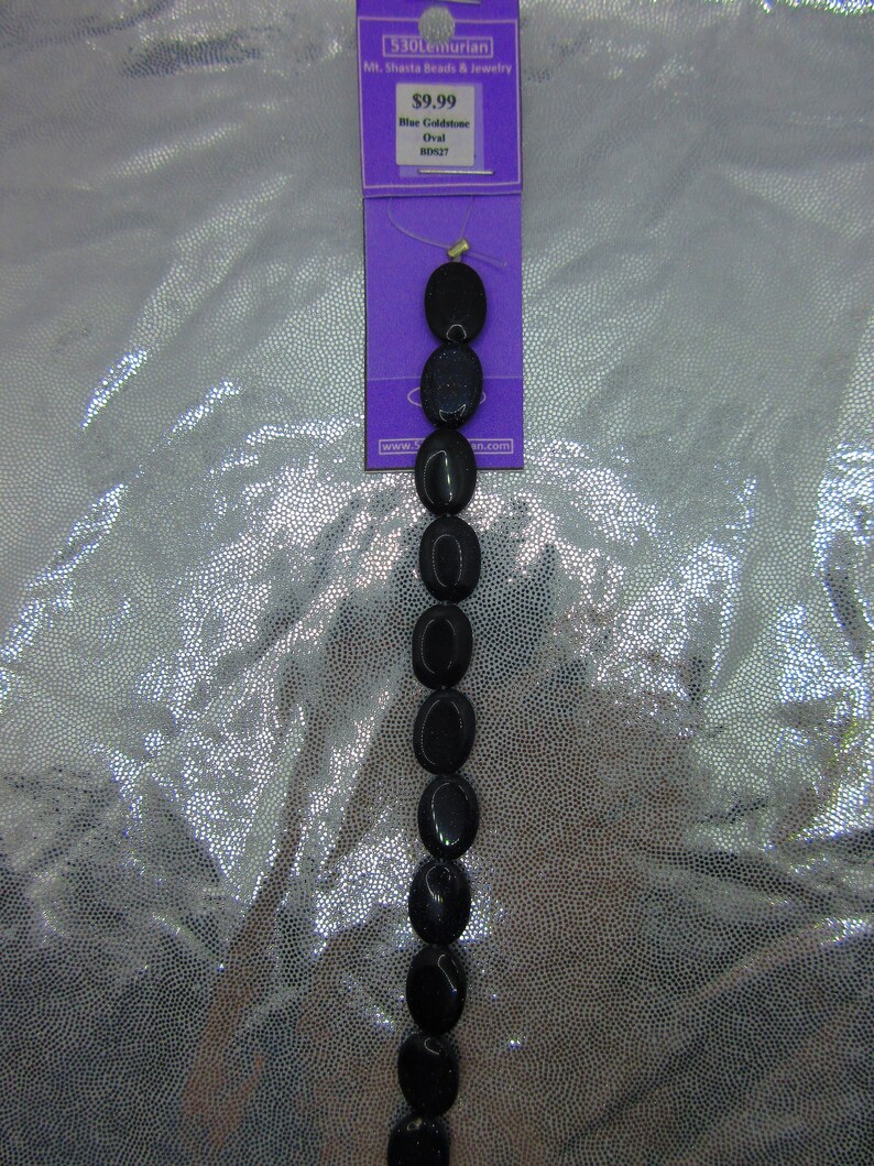 Blue Goldstone Oval 7 Bead Strand