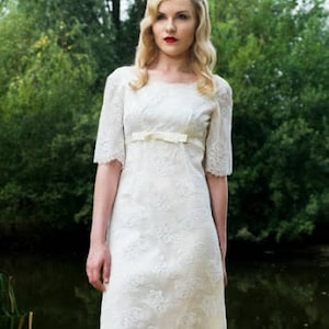 60s Vintage wedding dress, sweet and simple lace dress, pretty bell sleeves, bow under bust, soft slightly A line skirt. Small fitting UK 6