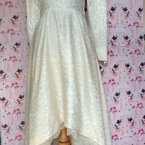 Vintage wedding dress 1950s glowing ivory damask satin with high neckline long sleeves and Hi-Lo hem. Dainty little collar & floral buttons. image 2