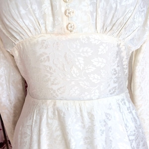 Vintage wedding dress 1950s glowing ivory damask satin with high neckline long sleeves and Hi-Lo hem. Dainty little collar & floral buttons. image 3