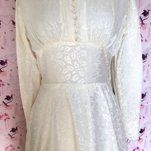 Vintage wedding dress 1950s glowing ivory damask satin with high neckline long sleeves and Hi-Lo hem. Dainty little collar & floral buttons. image 7