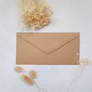 Enveloppe rectangulaire format DL turquoise, saumonée ou kraft (ne peuvent être vendues seules)