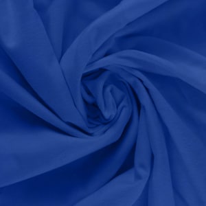 May include: A close-up shot of a bolt of royal blue fabric, tightly swirled to create a dynamic pattern. The fabric appears soft and has a slight texture, with deep shadows and highlights emphasizing the folds and curves.