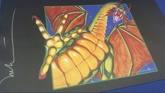 メリッサ・ベンソンのサイン入りシヴァン・ドラゴンプレイマット