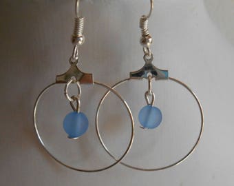 Mini hoops with their blue beaded heart