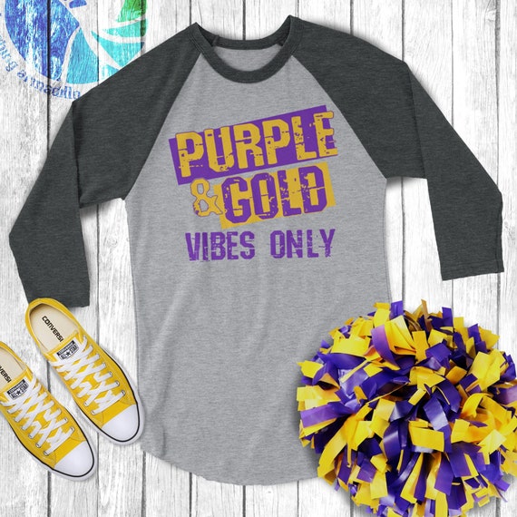 purple and gold raglan shirt