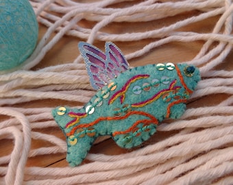 Poetic turquoise or coral flying fish brooch hand-embroidered in natural wool felt