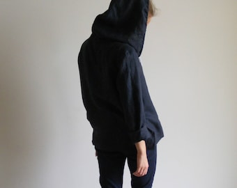 girl hiding in hoodie