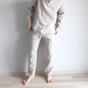 Pantalon en lin coupe ample. Pantalon à cordon