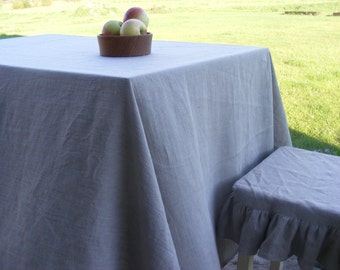 Natural Linen Tablecloth finished with mitered corners.