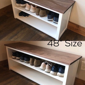 Puede incluir: Dos bancos de almacenamiento de zapatos blancos con una tapa de nogal natural. El banco de la izquierda mide 91 cm de largo y el banco de la derecha 122 cm de largo.