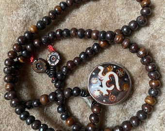 OM - Redesigned Tibetan horn mala | Tibetan amulett OM / two-sided | red threading