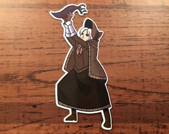 Muñeca inspirada en Bloodborne con una gran pegatina