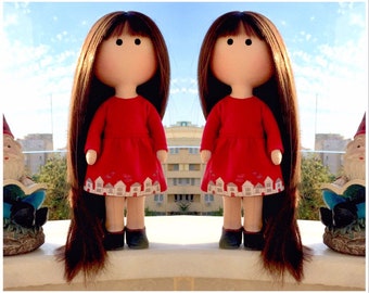 Twins? No, only optical illusion. This is one textile tilda doll in a red dress with a backpack. Portrait doll for one wonderful girl.