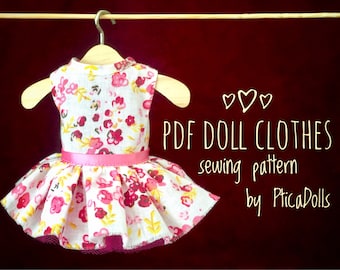 May include: A white dress with a pink floral print and a pink ribbon around the waist. The dress is hanging on a wooden hanger. The text "PDF DOLL CLOTHES sewing pattern by PticaDolls" is written in white on a red background.