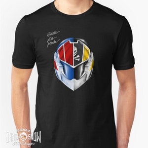 May include: Black t-shirt with a white, blue, red, and yellow robot helmet graphic. The text "Robotic Air Mecha" is written in white cursive above the helmet.