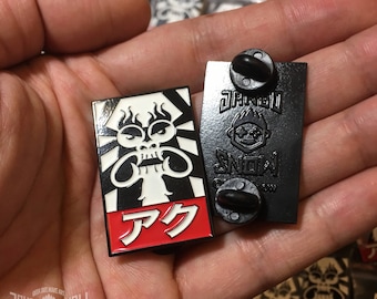OBEY AKU glow-in-the-dark 1.5" soft enamel pin, inspired by Samurai Jack