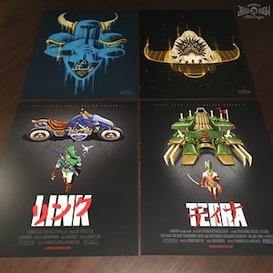 May include: Four movie poster prints featuring characters from the video game series Final Fantasy. The posters are black with white text and feature a character from the game, a vehicle, and the title of the game. The posters are titled "Link", "Terra", "Shadow", and "Cid".