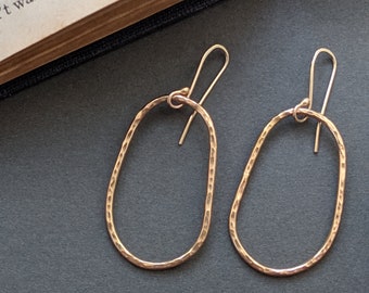 Large Asymmetrical oval gold hoops