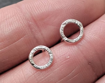 Shimmery silver tiny hoop studs