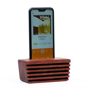 Red wood phone speaker with phone installed