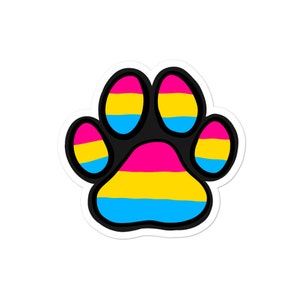 May include: A sticker featuring a paw print design. The paw print is black with each pad and toe filled with the colors of the pansexual pride flag: pink, yellow, and blue. The sticker has a white border.