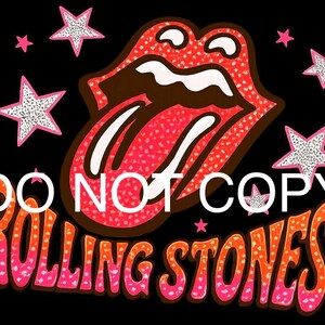 May include: Black graphic design featuring the Rolling Stones' iconic tongue and lips logo in red and pink, surrounded by pink and white stars. The words "Rolling Stones" are in a gradient orange and pink font. The text "DO NOT COPY" is overlaid in white.