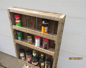 Wall mounted spice or olive oil storage shelf
