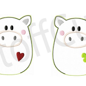 Puede incluir: Dos dise&ntilde;os de bordado de cerdo blanco. El cerdo de la izquierda tiene un coraz&oacute;n rojo y el cerdo de la derecha tiene un tr&eacute;bol de cuatro hojas verde.