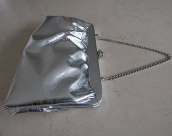 Silver Clutch Purse with Chain Handle.