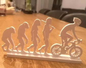 Human Evolution Cycling Sculpture - Minimalist 3D Printed Art Decor