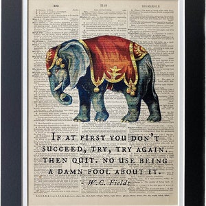 May include: A vintage dictionary page with an illustration of a red and gold-trimmed elephant wearing a red and gold-trimmed circus costume. The page includes the text "If at first you don't succeed, try, try again. Then quit. No use being a damn fool about it. - W.C. Fields."
